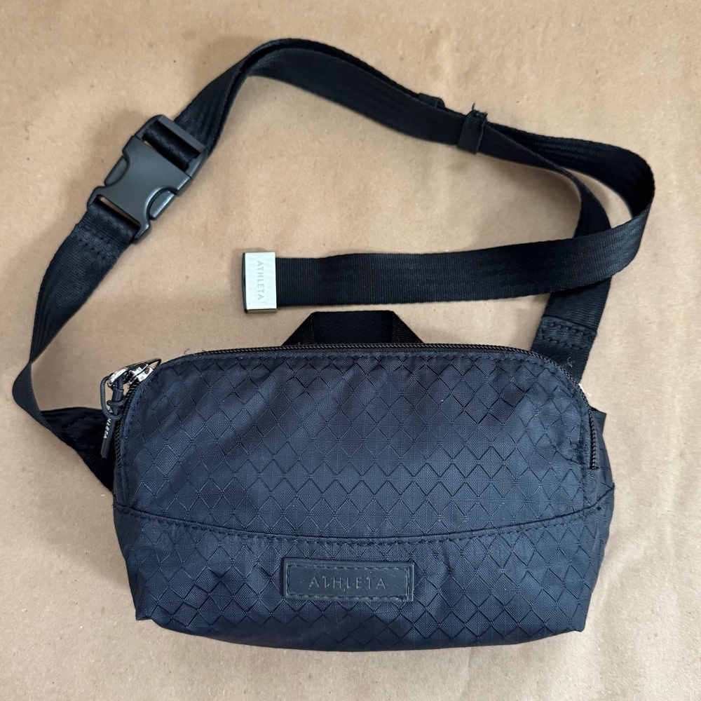 Athleta Excursion Mini Crossbody Belt Bag in black. 8” by 4” by 2”